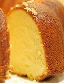 a bundt cake is cut in half and ready to be served on the table