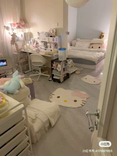 a room filled with lots of white furniture and decor on top of carpeted floors