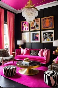 pink and black living room with zebra print furniture, chandelier and pictures on the wall