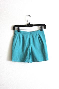 super sweet vintage right here. High-rise handmade shorts.  features turquoise corduroy fabric side metal zipper no tags, handmade very good condition, fabric is worn in some spots modern size xs measurements waist (high-rise fit): 23 in (58 cm) hips: 30 in (76 cm) inseam: 4.25 in (12 cm) length: 13 in (33 cm) ♥ handmade vintage skirt in same fabric https://www.etsy.com/listing/1200924393/vintage-turquoise-corduroy-skirt Button Shorts, Corduroy Shorts, Vintage Rock, Corduroy Skirt, Vintage Turquoise, Vintage Skirt, Short Outfits, Side Zipper, Casual Shorts