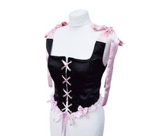 This delicate corset was created for a modern-day fairy princess to help to evoke the magical spirit of your own personal fairy tale. This corset is made from atlas. Tie up sleeves are made from chiffon. It is decorated with ribbon bows and guipure. Sleeves have a little warmer pink tone than the rest of the pink details. This corset features: -Corset has back lacing (~2 m of satin ribbon) -The bows on the shoulders can be re-tied to fit perfectly -Corset is fully lined with atlas fabric - Brass Front Lace Corset, Princess Corset, Rose Corset, Modern Corset, Pink Corset Top, Pink Corset, Corset Bustier, Strapless Corset, Fairy Princess