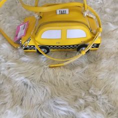 Kate Spade Leather Taxi Bag Can Be Worn As Satchel Or Comes With Crossbody Strap Brand New Kate Spade 3d Taxi Cab Crossbody Purse/Handbag - Sold Out! Style: Kk6614 100% Authentic, Proof Of Purchase Will Be Provided With The Item. Brand New In Excellent Condition, With Tags, Etc. This Vibrant Statement Making Piece By Kate Spade New York Will Be The Talk Of The Town! The Fun Structured Shape Will Keep You Organized While Delighting Passersby. Small To Medium Sized Bag; Approximate Measurements: 9 Kate Spade Yellow Shopping Bag, Yellow Kate Spade Travel Bag, Yellow Kate Spade Shopping Bag, Blue Kate Spade Purse, Leather Zip Pouch, Striped Bags, Medium Sized Bags, Taxi Cab, Kate Spade Totes