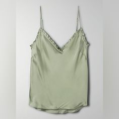 Wilfred Ruffle Camisole In Size Medium. Color: Silver Sage Green Never Worn, Doesnt Fit Me Right! Flirty Ruffled Camisole Top, Flirty Ruffled Camisole Tank Top, Flirty Ruffled Cami Tank Top, Chic V-neck Ruffled Camisole, Fitted V-neck Camisole With Ruffles, Feminine V-neck Camisole With Ruffles, Flirty Camisole Top With Ruffles, Flirty Spaghetti Strap Tank Top With Ruffles, Flirty Cami Tank Top With Ruffles