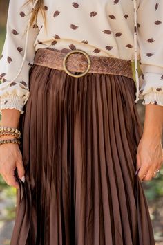 We cannot get over how stylish this skirt is! The cinched waist and accordion accents makes this such a cute, elegant look! Wear this skirt to any event and you are sure to receive compliments! We love tucking a blouse into this for a more elevated look or a basic or graphic tee for a casual feel!97% Polyester & 3% SpandexHand wash cold. Color separate. Do not bleach. Lay flat to dry. Low iron if needed. Skirt With Elastic Waistband For Spring Night Out, Elastic Waistband Skirt For Spring Night Out, Spring Skirt With Elastic Waistband For Night Out, Spring Night Out Skirt With Elastic Waistband, Flared Skirt With Elastic Waistband For Night Out, Chic Accordion Pleats Mini Skirt For Fall, Flowy Lined Pleated Skirt For Night Out, Elegant Spring Skirt With Elastic Waistband, Elegant Spring Mini Skirt With Accordion Pleats