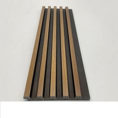 several different types of wood planks on a white background