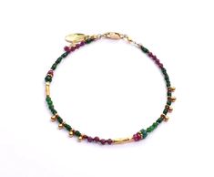 Gold Fill Bracelet with 18K Vermeil, Ruby, Emerald, Ruby Zoisite 7.13" Chipita uses rare vintage beads, precious, and semi-precious gemstones in their work. There may be some color variation in the stones they use and due to the nature of vintage beads, there may be some design variation. We'll be in contact asap if the piece you ordered varies from what's photographed. Tourmaline Natural Stones Bracelets As Gift, Bohemian Rondelle Bracelets With Polished Beads, Tourmaline Bracelets With Natural Stones, Gold Tourmaline Bracelet Jewelry, Gold Tourmaline Bracelet, Spiritual Beaded Yellow Gold Bracelets, Gold Bracelets With Natural Stones And Tourmaline, Fusion Style Beaded Bracelets With Gemstones, Handmade Yellow Gold Fusion Bracelets