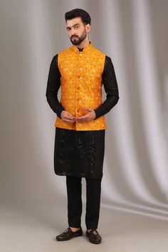 Yellow silk bundi with zari embroidered jaal patterns, embellished by sequins on a bandhej pattern base. - Aza Fashions Silk Nehru Jacket With Zari Work In Bollywood Style, Bollywood Style Silk Nehru Jacket With Zari Work, Unstitched Brocade Nehru Jacket For Festivals, Bollywood Style Art Silk Nehru Jacket With Cutdana, Bollywood Silk Nehru Jacket With Chikankari Embroidery, Festive Designer Wear Chanderi Nehru Jacket, Chanderi Nehru Jacket For Designer Wear And Festive, Festive Chanderi Nehru Jacket For Designer Wear, Festive Brocade Nehru Jacket With Cutdana Detailing