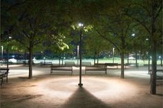 the park benches are lit up at night