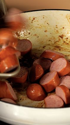 the food is being cooked in the pot on the stove