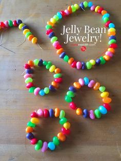 colorful beaded bracelets and earring sets on a wooden table with the words jelly bean jewelry