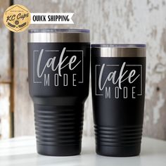 two black tumblers with the words cake mode on them