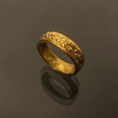 Unique 22k solid gold band, naturally curved & textured 22k gold wedding ring, unisex gold ring, handmade fine jewelry, resizable. Weight. 8.60g Width. 5.5 - 6.5mm Thickness. 1.5 - 2mm Size. 16.5 US size. 7.5 Resizable Please contact me for your size :) Hand Forged Gold Engraved Promise Ring, Handmade 22k Gold Rings For Anniversary, Hammered 22k Gold Jewelry For Anniversary, Hammered 22k Yellow Gold Rings, 22k Gold Hammered Jewelry For Anniversary, Gold Hammered Bands For Promise Ring, Handmade 22k Gold Heirloom Ring, Gold Byzantine Hand Forged Rings, Handmade Heirloom 22k Gold Ring