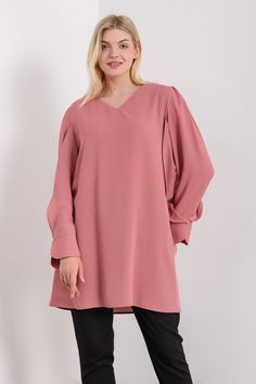 The versatile style of this top makes it easy to dress up or down, whether you pair it with jeans for a casual daytime look or dress pants for a night out. The flattering fit and flowy design make it perfect for any body type. Add a pop of color to your wardrobe with the vibrant range of colors available in this top. From classic black to khaki, there's a color to suit any taste! SPECS: Material: Polyester Color: Pink Fit: Relaxed Size: Oversized Sleeve: 3/4 Product Highlight: ● Simple and elega Leggings And Heels, Summer Tunic, Summer Tunics, Oversize Sleeves, Flowy Design, Pink Tunic, Pink Fits, Cuff Detail, Oversized Silhouette