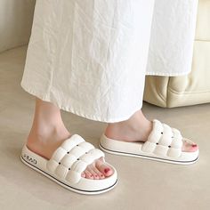 The Bubble Woven Slides are perfect for your spring and summer occasions! These slides go well with many outfits like shorts and a t-shirt or a summer dress and will keep you cool. The single strap has a woven design that sits comfortably on the top of your foot. See for yourself why these slides are great! FEATURES: Style Open Toe Season Spring/Summer Sole Flat Vamp material EVA COMFORTABLE MATERIAL: The Bubble Woven Slides are made of high-density material. These are light, soft, and breathabl Casual Beach Slides, Summer Slides For Spring Vacation, Trendy Slides For Day Out, Casual White Slides For Beach Season, Summer Style Slides For Vacation In Spring, Spring Vacation Slides, Trendy Slides For Summer Outings, Trendy White Beach Slides, White Summer Slides