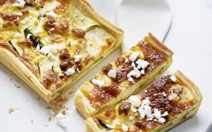 two slices of quiche on a white plate