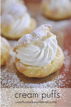 cream puffs with powdered sugar on top