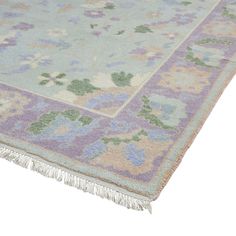 Create a welcoming space with a sweet aesthetic in any room with our Olivia Rug in Lilac Sage. Elevate the look and feel of your home décor with soft sage hues and precious pops of lilac and blue. This playful yet sophisticated decorative rug will brighten bedrooms and open small spaces with its light and airy design. The floral rug design creates a charming backdrop for all your modern and traditional furnishing and home décor. As durable as it is stylish, the hand-knotted wool rug provides pro Lilac Rug, Brighten Bedroom, Blue Green Bedrooms, Lavender Rug, Sweet Aesthetic, Caitlin Wilson, Statement Rug, Floral Area Rug, Wallpaper Furniture