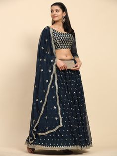 More collection Visit Our Shop  https://fabwindow.etsy.com Customize Stitching : Please Provide Your Complete size. we will stitch your outfit according to your size. Lehenga  👉🏻 Fabric & Work :- Pure Faux Georgette with Sequined Embroidered work.  👉🏻 Length :- 42 Inch. 👉🏻 Waist :- 42 Inch. (Made to Measure) 👉🏻 Inner :- Cotton 👉🏻 Flair :- 4 MTR 👉🏻 Closure :- Chain Attached & With Dori 👉🏻 Stitching Type :- Semi Stitched Blouse (Choli) 👉🏻 Fabric & Work :- Pure Faux Georgette Fabric with Sequined Embroidered Work 👉🏻 Length :- 1 MTR Dupatta 👉🏻 Fabric & Work :- Pure Faux Georgette Fabric With Sequined Embroidered Work 👉🏻 Length :- 2.30 MTR 👉🏻 Color:- Turquoise 👉🏻 Weight :- 1.5 KG WHAT IS SEMI-STITCHED. In a semi-stitched Lehenga set, the Lehenga/ Skirt will come with a Party Wear Embroidered Sharara For Navratri, Diwali Party Embroidered Fabric, Party Wear Embroidered Choli For Party, Embroidered Party Wear Sets For Navratri, Embroidered Georgette Lehenga For Party, Party Wear Floor-length Embroidered Lehenga, Embroidered Lehenga For Party Festivities, Party Lehenga With Embroidery, Floor-length, Traditional Semi-stitched Skirt Set For Party