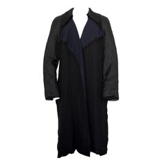 Lanvin Paris Black coat with Navy inlay Lightly worn Great Condition Has belt loops, but doesn't come with a belt. Total length 45" Made of 100% Silk Multi-textured Size 34 Lanvin Felt Coat, Lanvin Polymid Coat, Silk Duster Coat, Black Duster Coat, Black Coat, Lanvin, Black And Navy, Duster Coat, Fashion Outfits