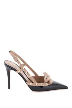 Valentino Garavani patent leather slingback pumps embellished with iconic platinum studs and a nappa bow. Leather footbed and leather sole. Leather Cap, Boot Pumps, Sneaker Heels, Slingback Pump, Black Patent Leather, Leather Pumps, Lanvin, Flip Flop, Shoulder Handbags