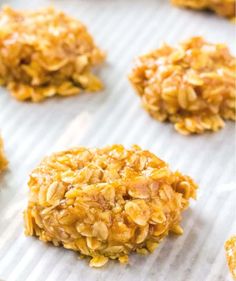 some cookies are on a baking sheet and ready to be baked in the oven or used as an appetizer