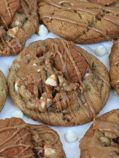 chocolate chip cookies with marshmallows and drizzled in the middle