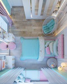 a small bedroom is decorated in pastel colors