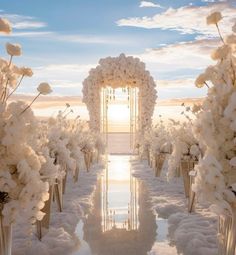 an outdoor wedding ceremony with white flowers