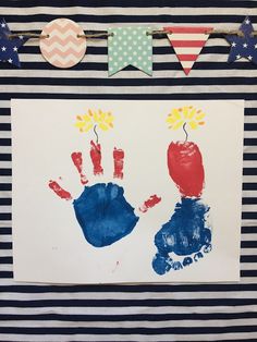 an art project with hand prints and bunting