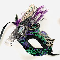 "Holiday Party Mask Masquerade Ball Mask metal filigree laser cut Masks for women This Mask is stunning and has a very detailed filigree pattern adorned with pearls and rhinestones. Shimmer detail in gold, purple, and green. If shimmer needs to be customized pls leave a check out note with your ideas! S H I P P I N G - Last minute Masquerade Mask shopping? Processed same day or within 24 hours. 1-2 day guaranteed delivery services offered, add items to cart and click on shipping tab for rates. P Fantasy Style Masquerade Mask For Mardi Gras, Luxury Mardi Gras Eye Masquerade Mask, Purple Masquerade Mask For Mardi Gras Carnival, Purple Masquerade Mask For Carnival, Luxury Mardi Gras Mask, Masquerade Mask Women, Masquerade Ball Masks, Masquerade Ball Mask, Butterfly Mask