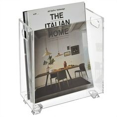 a clear acrylic magazine holder with the italian home cover on it's front