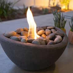 there is a bowl with rocks in it