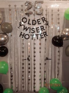 an old wester themed birthday party with balloons, streamers and stars on the wall