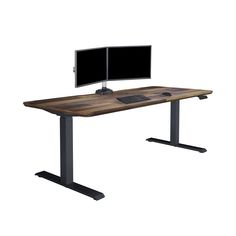 a computer desk with two monitors on it