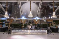 an indoor venue with lights and music equipment