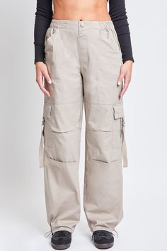 Add style, comfort, and versatility to your pant collection with our women’s elastic waist cargo pants. This relaxed-fit cargo pant is constructed with lightweight cotton fabric for maximum comfort and versatility. Our cargo pants for women have a relaxed leg, baggy fit from hip to hem, and are full-length with a draws Baggy Straight Leg Cargo Pants With Elastic Waistband, Utility Khaki Cargo Pants With Elastic Waistband, Utility Cargo Pants With Elastic Waistband In Khaki, Baggy Utility Cargo Pants With Elastic Waistband, Relaxed Fit Wide-leg Utility Cargo Pants, Utility Parachute Pants With Elastic Waistband, Full Length Cargo Pants For Spring, Full-length Spring Cargo Pants, Spring Full Length Cargo Pants