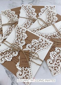 wedding cards with lace and twine tied together