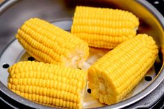 corn on the cob in an electric cooker