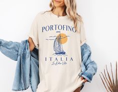 Portofino Shirt *Be sure to check the size chart within the listing.  TEE INFO/CARE  * Garment Dyed 100% cotton * Pre-Shrunk * Unisex, Loose fit (Size Up 1-2 sizes for Oversized) * Wash inside out in COLD water * Lay flat to dry or machine dry on LOWEST setting * Iron on LOW * Do NOT dry clean ♥ Items are printed with eco-friendly DTG (Direct to Garment Printing) technique. Inks are water based, bio-degradable and non-toxic. Artwork is digitally transferred directly onto the fabric, giving it a Italia Shirt, Italian Shirts, Portofino Shirt, Money Aesthetic, Old Money Aesthetic, Old Money, Lay Flat, Comfort Colors, Favorite Outfit