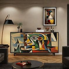 a living room filled with furniture and paintings on the wall