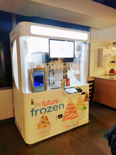 an ice cream vending machine in a kitchen