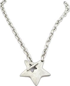 a silver necklace with a star on it