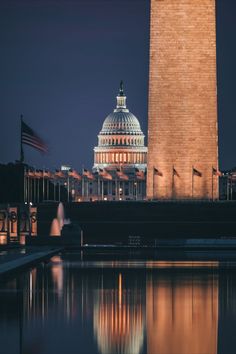 the capitol building is lit up at night