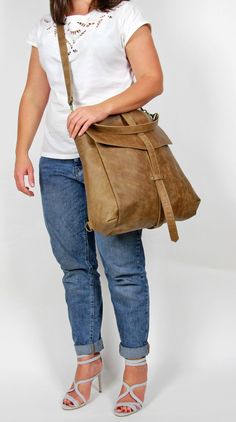 Brown Duffle Bag With Removable Pouch For On-the-go, Beige Satchel Backpack With Large Capacity, Brown Leather Backpack With Adjustable Strap For On-the-go, Light Brown Bag For Everyday Use With Large Capacity, Beige Tote Backpack With Large Capacity, Beige Large Capacity Tote Backpack, Leather Double Handle Shoulder Bag For School, Leather Double Handle School Shoulder Bag, Daily Use Satchel Backpack With Removable Pouch