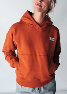 Using our cozy, heavyweight fleece fabric, we crafted this hoodie with drop shoulder construction for a casual fit and added iconic beardedgoat style lines. Gone For Good, Casual Fit, Cotton Fleece, Outdoor Woman, Outdoor Apparel, Casual Fits, Fleece Fabric, Burnt Orange, Drop Shoulder