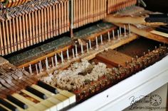 an old piano that is being used as a musical instrument for the music production process