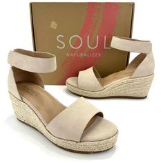 Soul Naturalizer "Oakley" Tan Ankle Strap Espadrille Wedge Platform Sandals. Product Details: Sustainably Sourced Produced Using Responsible Methods Or Materials. When It Comes To Wedges, We're All About Them. These Oakley Peep Toe Wedge Sandals From Soul Naturalizer Will Provide All-Day Comfort. Sandal Features: Easily Adjustable, Peep Toe Espadrille Wedge With A Manmade Upper. All-Thru Comfort: Soft Foam Lining, Arch Support With Memory Foam, And Antimicrobial Sock Lining. Lightweight And Flex Casual Adjustable Wedge Heels, Comfortable Natural Wedge Sandals For Spring, Casual Natural Platform Wedge Sandals, Comfortable Natural Color Wedge Sandals For Spring, Casual Summer Espadrilles Medium Width, Casual Natural Heels With Closed Toe, Casual Natural Wedge Sandals, Casual Natural Heels With Platform, Casual Natural Wedge Heels