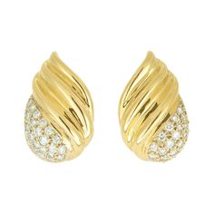 Flame design 18k yellow gold clip post diamond earrings with 18k posts and 14k clips 54 round brilliant cut diamonds H VS, approx. .70cts 18k yellow gold 14k yellow gold Stamped: 750 14k 16.1 grams Top to bottom: 22.5mm or 7/8 Inch Width: 14.5mm or 9/16 Inch Depth or thickness: 7.8mm Sapphire And Diamond Earrings, Flame Design, Swirl Earrings, White Gold Set, Retro Earring, Gold Clips, Design Earrings, Yellow Gold Earring, Gold Earrings Dangle