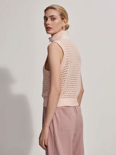 Made from a 100% cotton Float Pointelle Knit, this half-zip tank top will add a luxurious tactility to your look. The slightly cropped hem will work well with high-waisted pants and shorts. 100% Cotton Machine wash cool, do not bleach, do not tumble dry, iron on low, dry flat. wash with similar colours. reshape whilst damp The Bains is cut for a standard fit with dropped armholes. Take your true size. Studio model is 5'10.5", with a 30" bust, 23" waist, 35" hips, and wears a size small. Size S - Minimalist Summer Style, Minimalist Summer, Pointelle Knit, Open Knit Sweater, Midi Dress Casual, Summer Blouses, Casual Tops For Women, Spring Dress, Summer Essentials