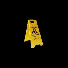 caution wet floor sign on a black background